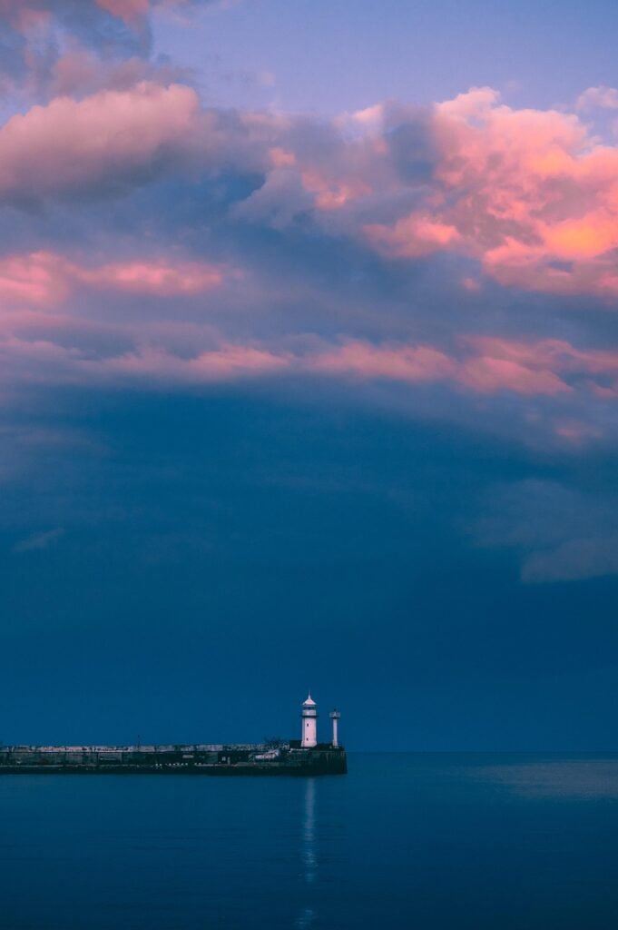 lighthouse, coast, sunset, clouds, phone wallpaper, nature, sea, sky, outdoors, aesthetic wallpaper, iphone wallpaper